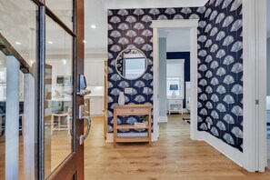 Your perfect getaway starts here, with a spacious entryway that greets you with warmth and style.