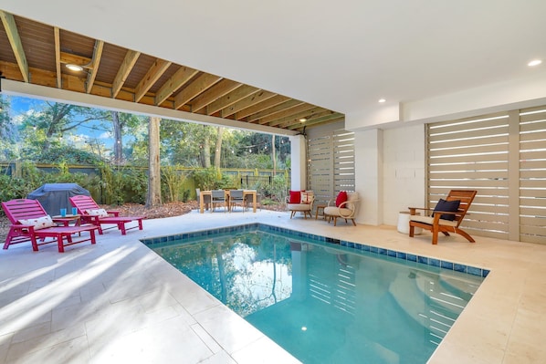 Enjoy year-round swimming in your own private indoor pool, conveniently located in the backyard for a luxurious and relaxing experience!