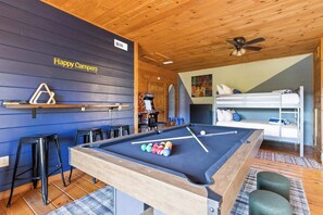 Bedroom 4: Bring the whole crew together! The bunk room offers cozy spots for everyone to sleep, while the game room is packed with fun