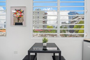 Savor your morning coffee in this cozy space, bathed in natural light, creating the perfect setting to start your day.