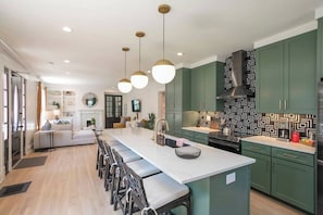 Newly Remodeled, Fully Stocked Kitchen w/Large island and breakfast nook