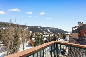 View of the slopes from the private balcony, accessible from the living room.
