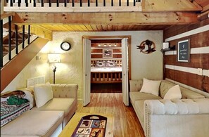 Living room with comfortable couches and big TV