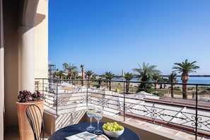 There is a balcony with a table and chairs where you can enjoy the view.