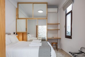 Master bedroom with desk area and a large wardrobe to place all your belonging 