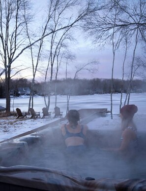 Embrace the views of the lake from your private 6-person hot tub.