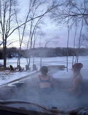 Embrace the views of the lake from your private 6-person hot tub.
