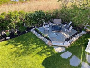 Swap stories under the stars around the gas fire pit