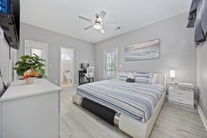 Main level bedroom with full bath shower and walk-in closet