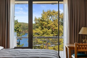 Floor-to-ceiling windows bring in natural light and frame the picturesque lake views.