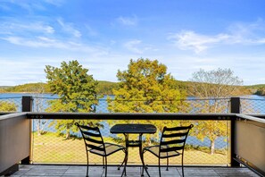 Step onto your private balcony and enjoy stunning lakefront views while sipping your morning coffee.