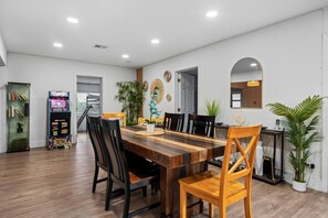 Gather around this  6-person dining table, perfect for enjoying meals and creating memorable moments with family and friends.
