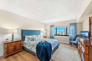 Stunning master bedroom with television