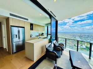 Balcony view - with sliding doors open to incorporate Kitchen and balcony