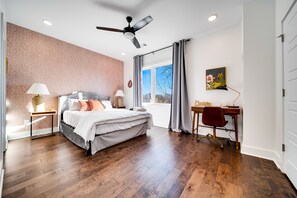 Third story king bedroom with ensuite bathroom and desk