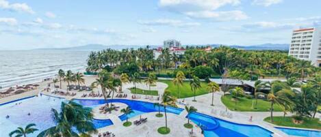 Ocean views & resort pool await! Enjoy your private balcony.