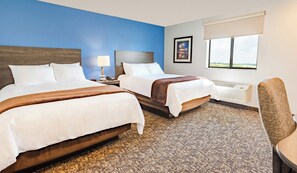 Unit with 2 Queen beds. Exact unit will be assigned upon arrival. Views, colors, and decor may vary.