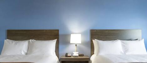Unit with 2 Queen beds. Exact unit will be assigned upon arrival. Views, colors, and decor may vary.