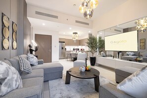 Spacious living room with an attached dining area and kitchen.