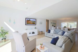 Spacious and inviting with plush seating, a smart TV, and stylish décor for ultimate relaxation