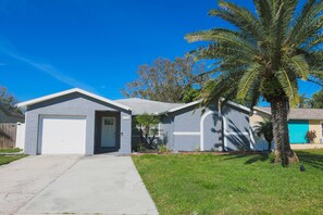 House front and neighborhood view