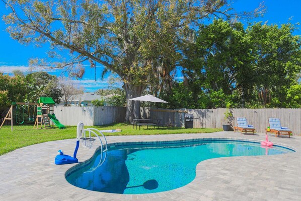 Beatiful pool with Lounge chairs and sofa