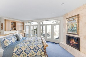 Primary suite with king bed and full bathroom