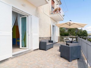 Blue, Chair, Outdoor Furniture, Design, Shade, Outdoor Table, Eco Hotel, Patio, Houseplant, Daylighting