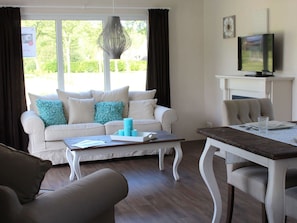 Blue, Chair, Outdoor Furniture, Design, Shade, Outdoor Table, Eco Hotel, Patio, Houseplant, Daylighting