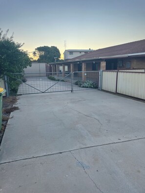 private fenced off street parking