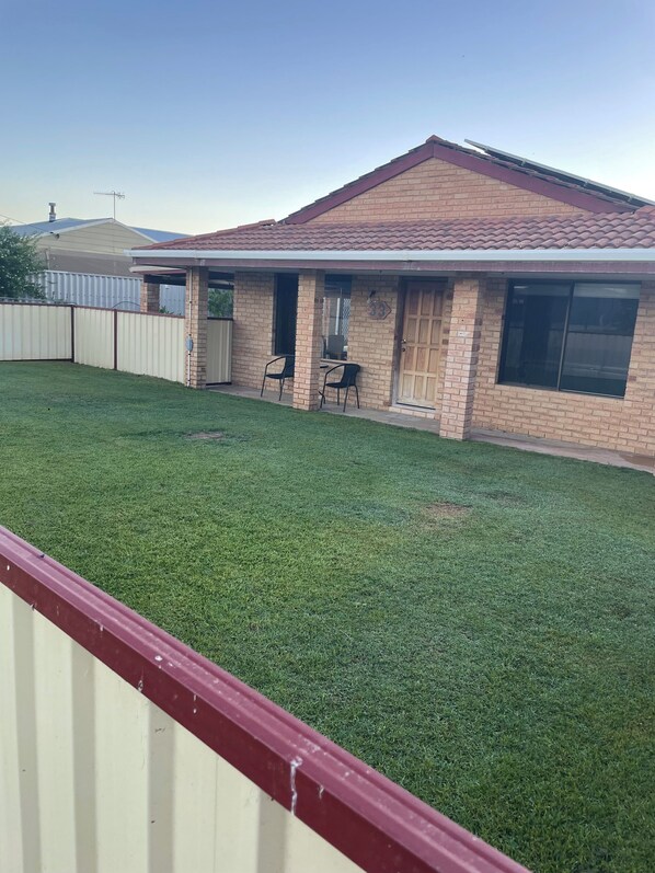 fenced front yard