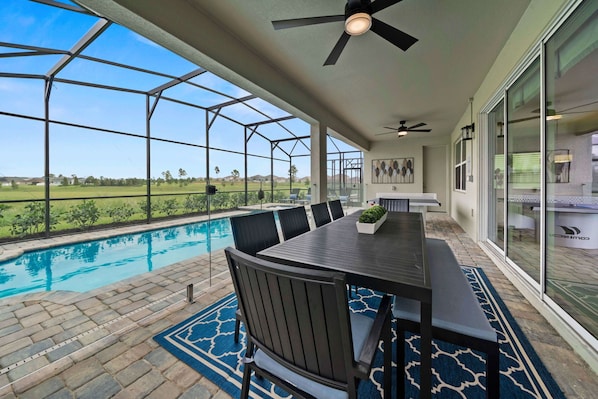 Pool area with outdoor dining
