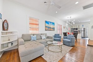 The Living Room Sofa Converts to a Comfortable Queen Size Bed