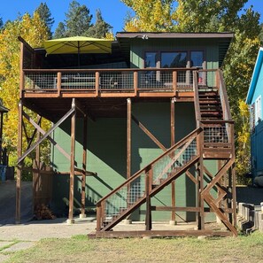 Stairs from the back deck to the yard and river.
