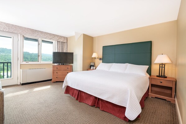 Bright and airy bedroom with soft hues and a serene atmosphere, perfect for a restful night's sleep.