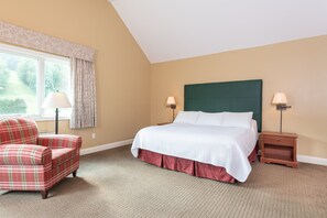 Cozy bedroom with an intimate feel and soft lighting, perfect for winding down in a peaceful setting.