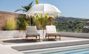 One of the lounge areas with great sunloungers