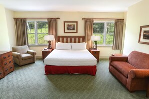 Serene bedroom retreat with soft linens and picturesque window views for a restful stay.