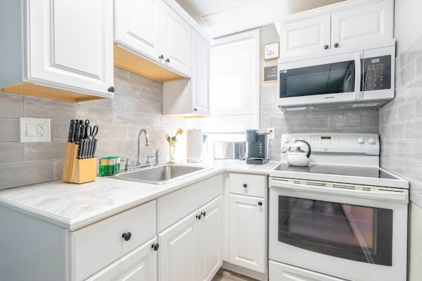 Prepare intimate meals together in a fully equipped kitchen.