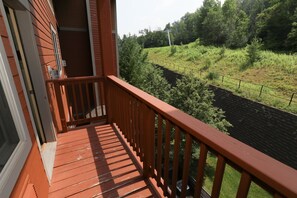 Private balcony with scenic views, ideal for enjoying the fresh air and outdoor surroundings.