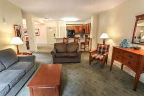 Cozy living area with plush seating and a warm, inviting atmosphere for relaxing.