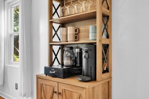 Nespresso Coffee and wine bar with wine rack—ideal for post-game celebrations

