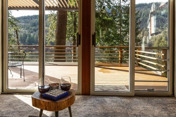 Sliding doors lead out to the large deck