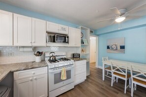 Whip up delicious vacation meals in this bright and functional kitchen.