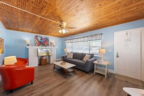 Picture cozy evenings and movie nights in this welcoming living room.
