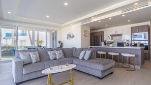 The L shaped sofa in the main room