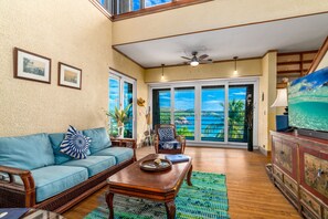 Spacious, comfy living room with flatscreen tv.