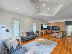 Living area with comfortable couches to seat 4 guests