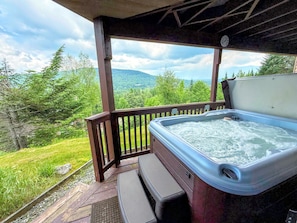 A hot tub on the lower level is a great way to relax after a hike or a day on the slopes!
