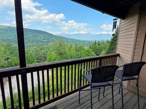 Small walkout deck on the main level with beautiful views. Accessible from both the living room and King Bedroom.